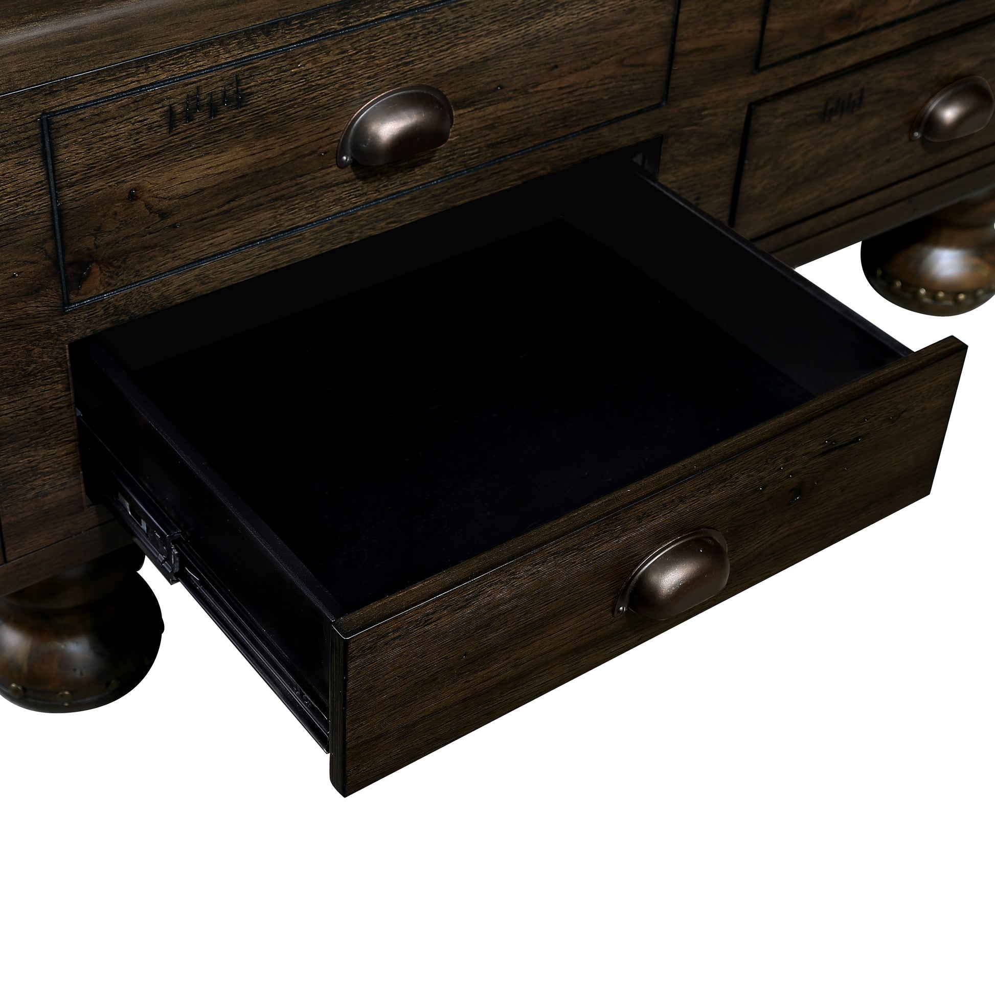 Dark wood dresser with antique bronze cup pull and open drawer