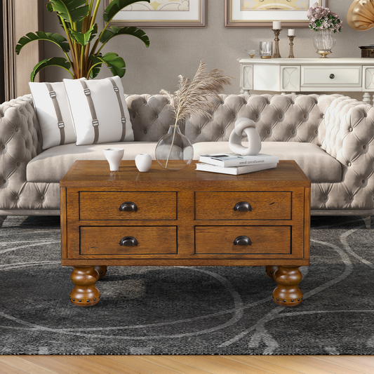 Antique oak coffee table with four drawers and decorative turned legs
