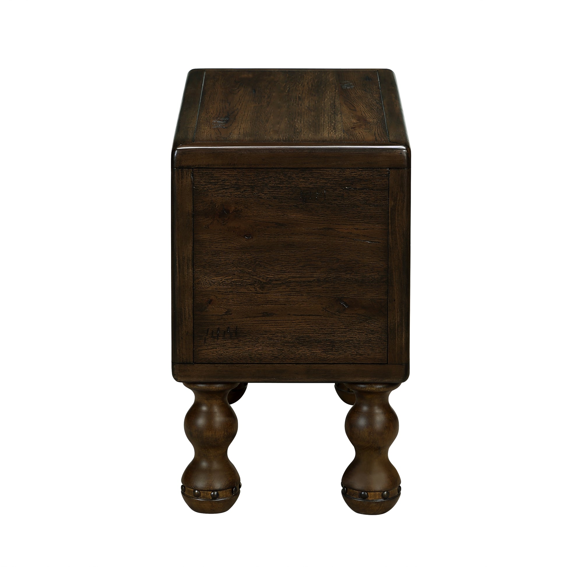 Dark wood end table with turned legs and ornate nailhead trim