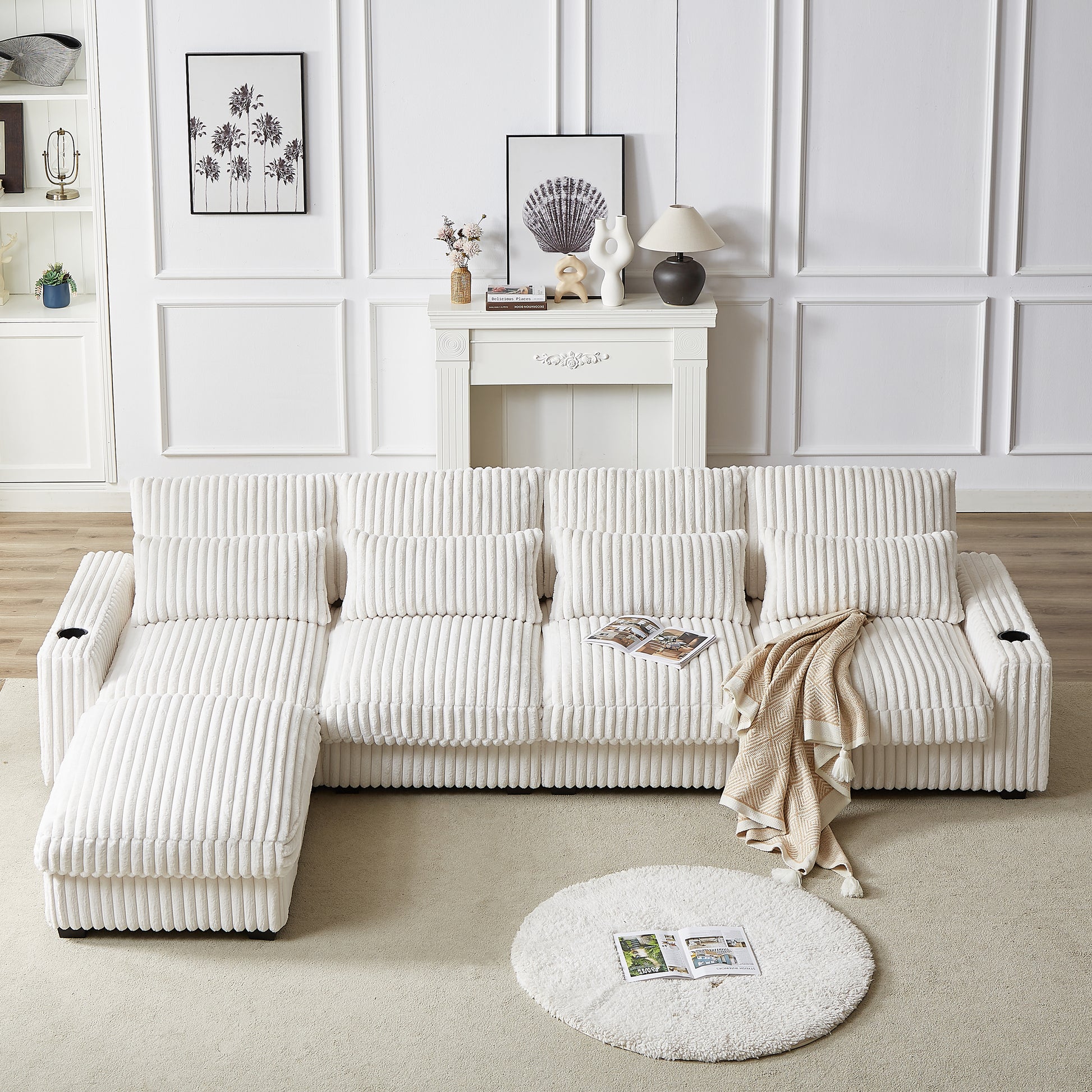 White corduroy sectional sofa with chaise and cup holders