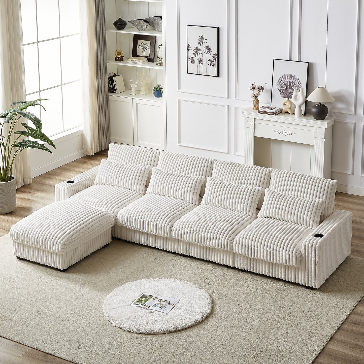 Plush white corduroy sectional sofa with chaise and matching ottoman