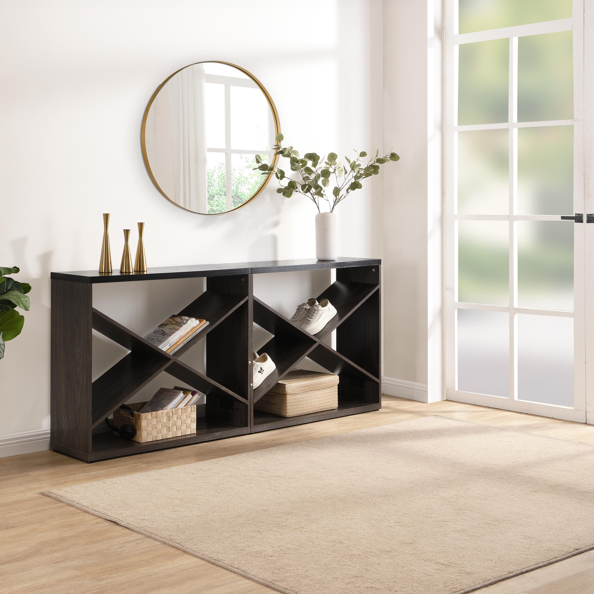 Dark wood wine rack with Xshaped shelves holding books and shoes