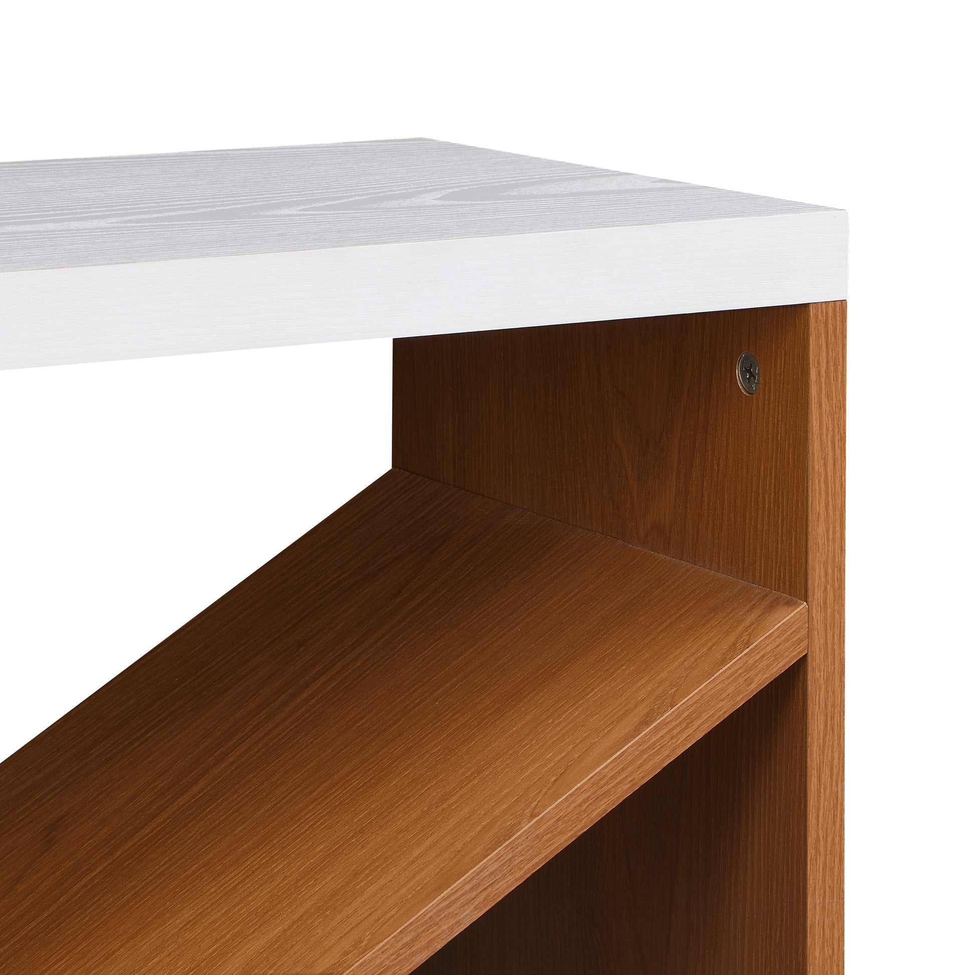 Closeup of a white woodgrain laminate shelf with a dark wood side panel