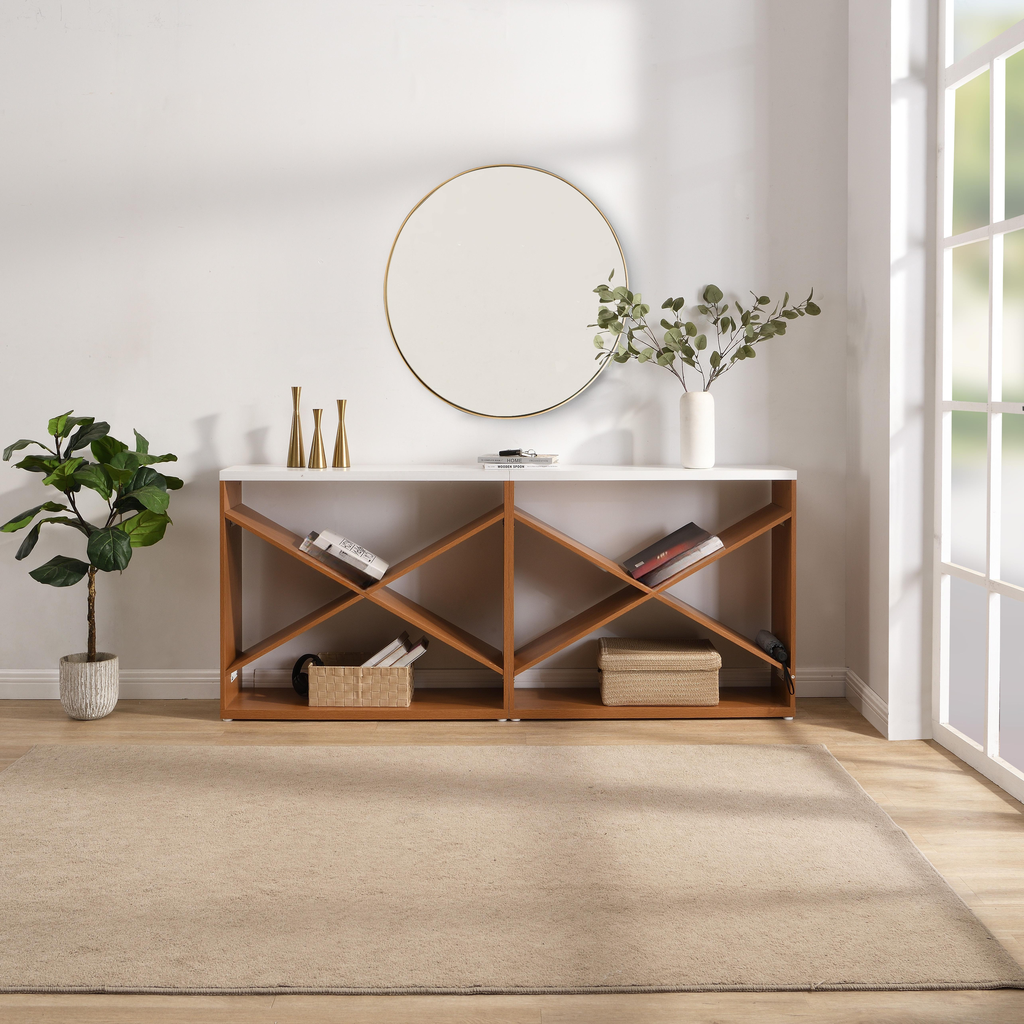 Golden framed round mirror reflecting natural light