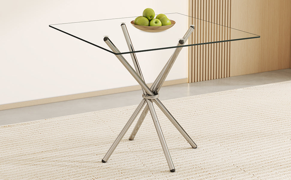 Glass dining table with chrome starburst base