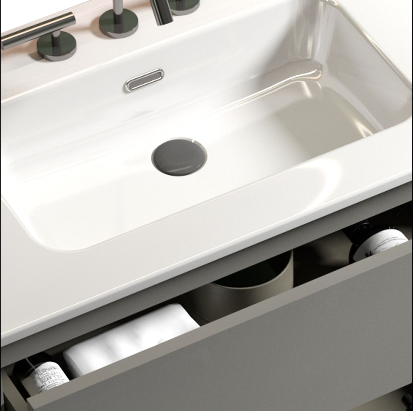 Modern white ceramic sink with chrome fixtures and organized vanity drawer