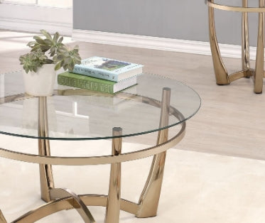 Modern round glass coffee table with gold metal base