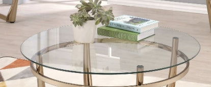 Round glass coffee table with gold frame