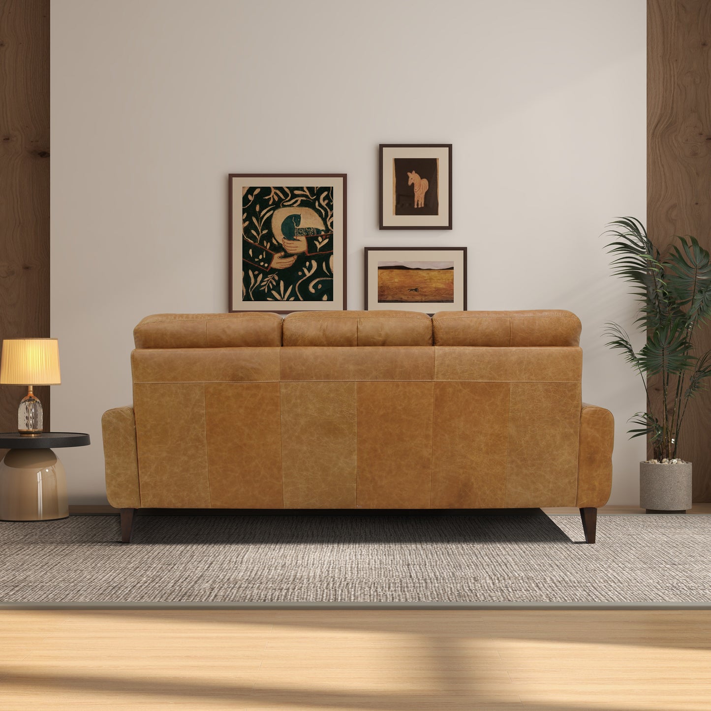 Luxurious tan leather sofa with tufted cushions perfect for a modern living room