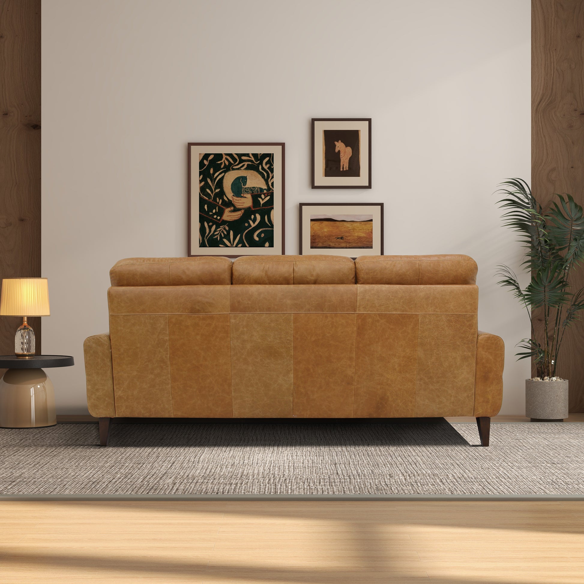 Luxurious tan leather sofa with tufted cushions perfect for a modern living room