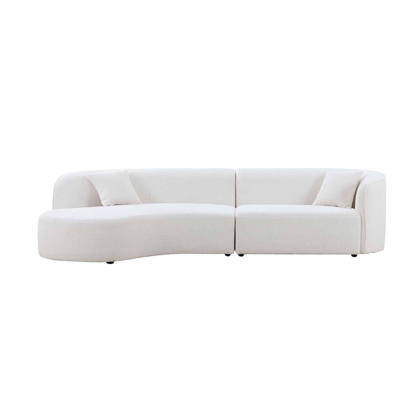 Curved white boucle sofa with plush cushions for a modern living room
