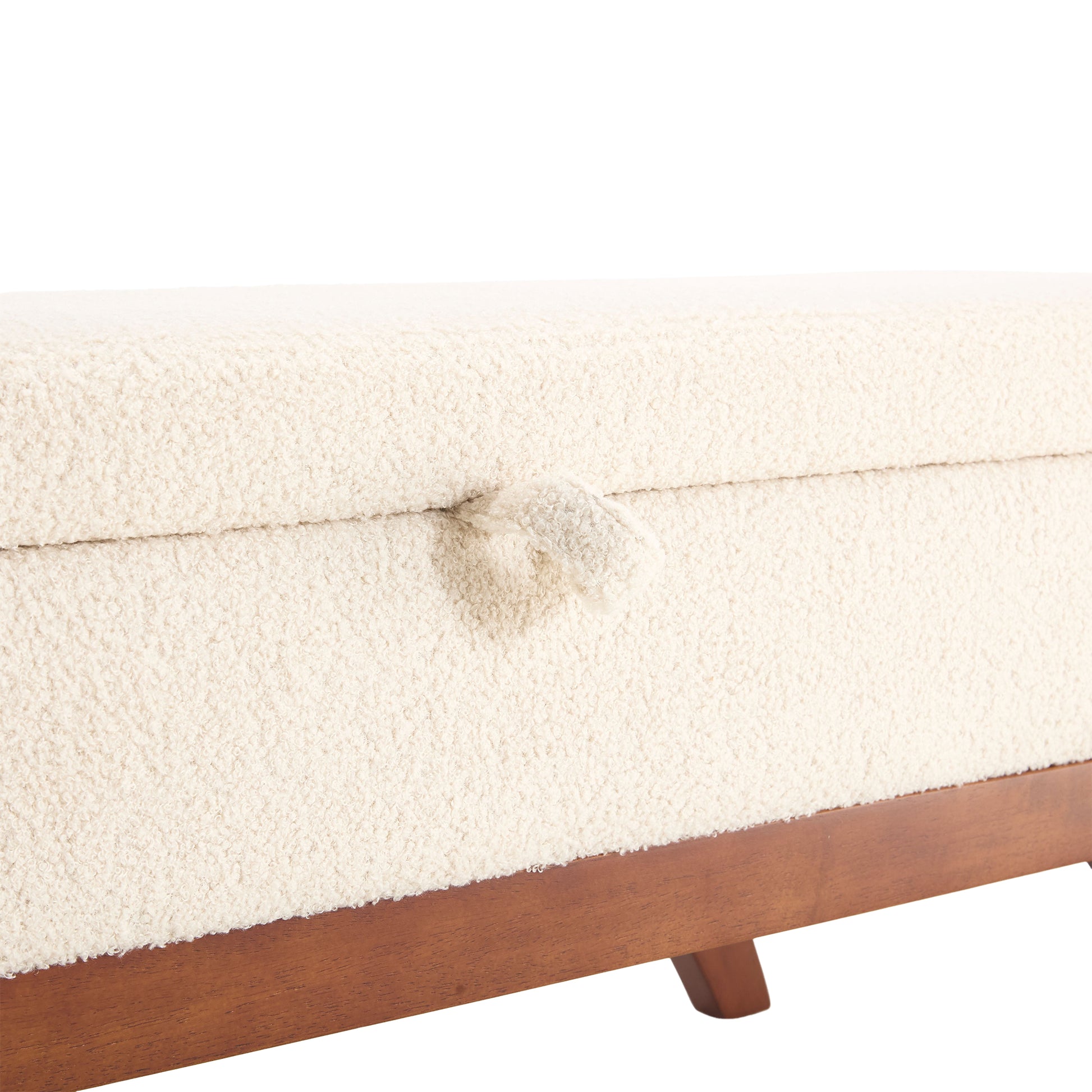 Cream boucle storage ottoman with wooden legs