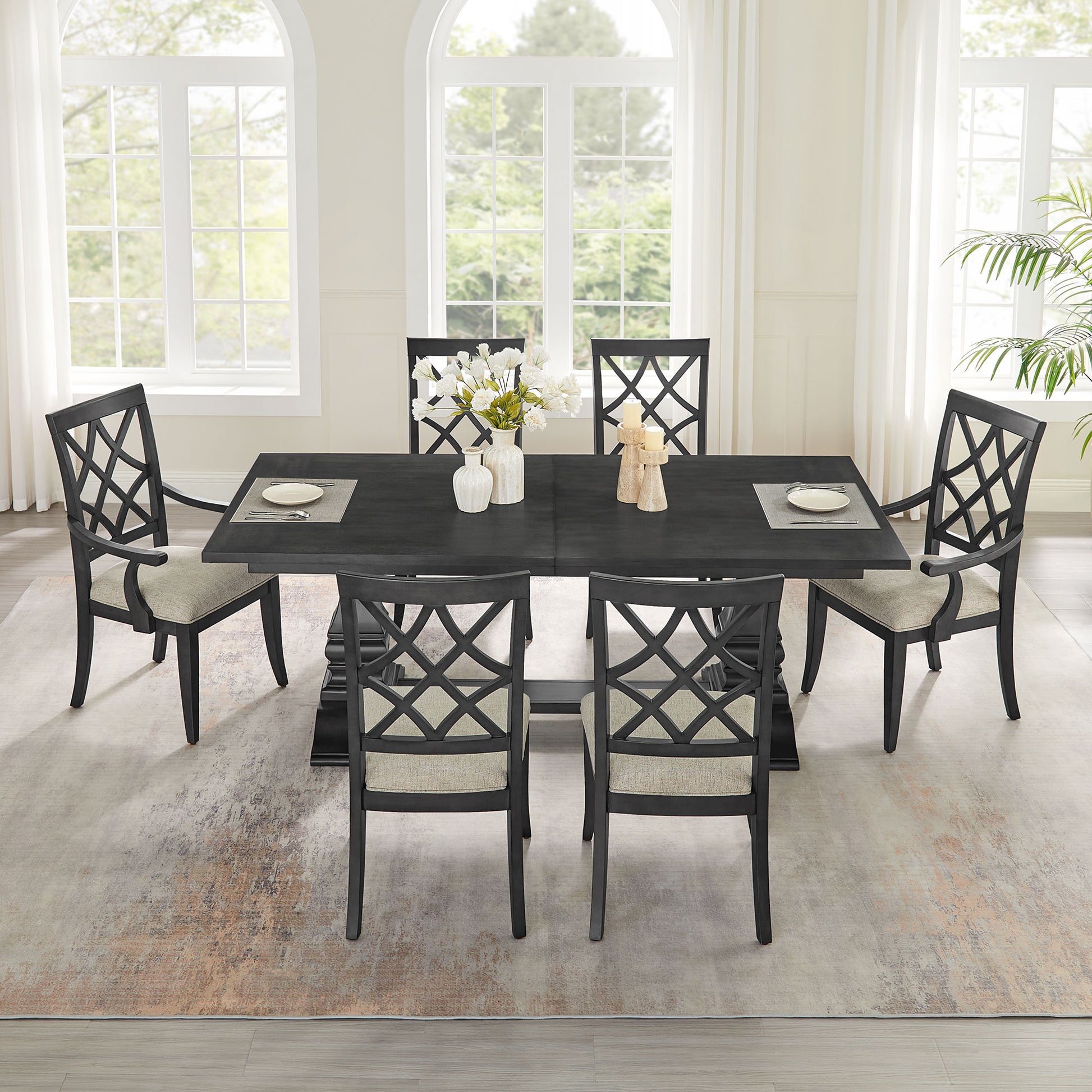 Dark gray rectangular dining table with cushioned chairs