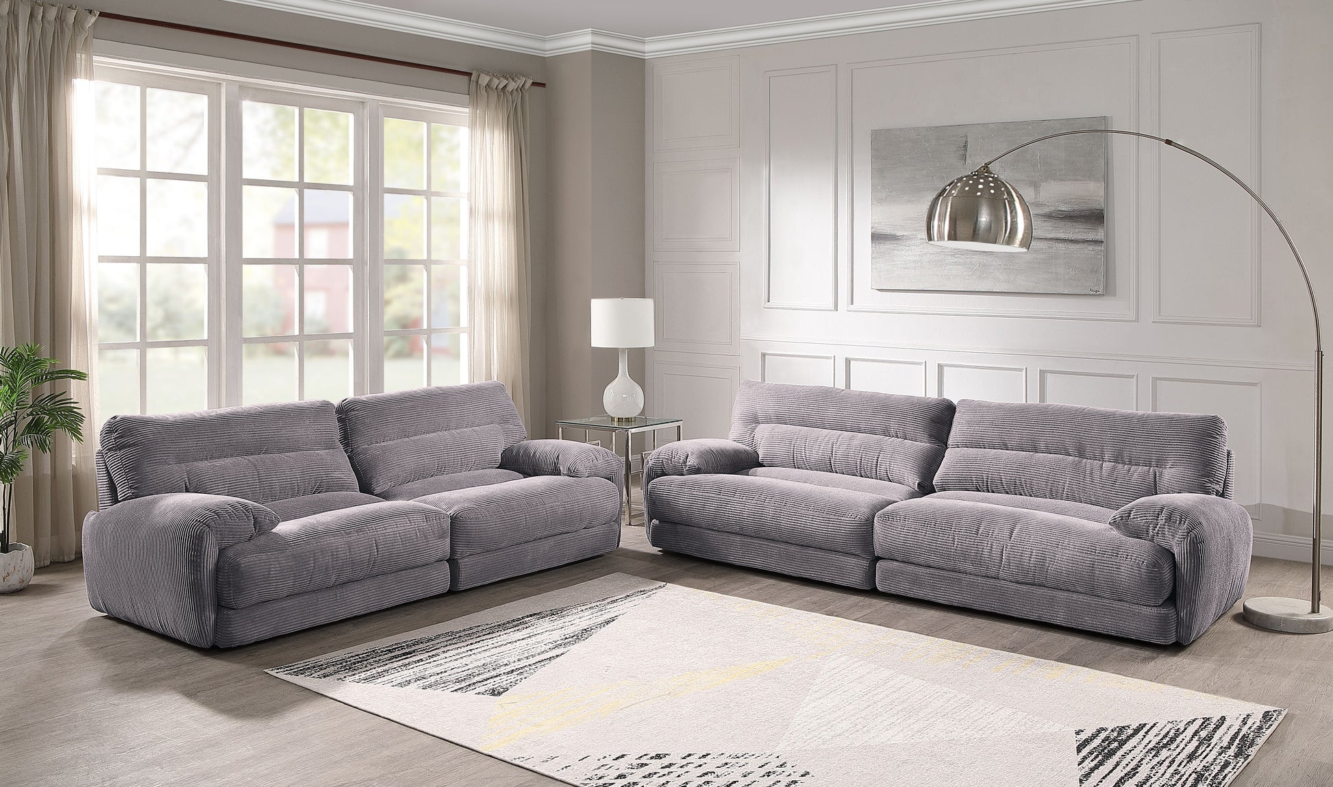 Plush gray corduroy reclining sofa for ultimate comfort