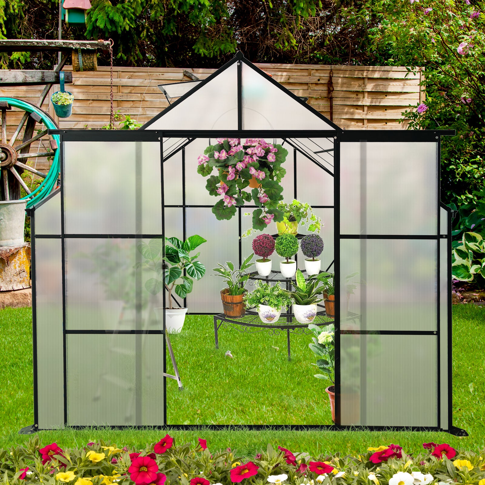 Polycarbonate greenhouse with black frame holding potted plants and hanging baskets