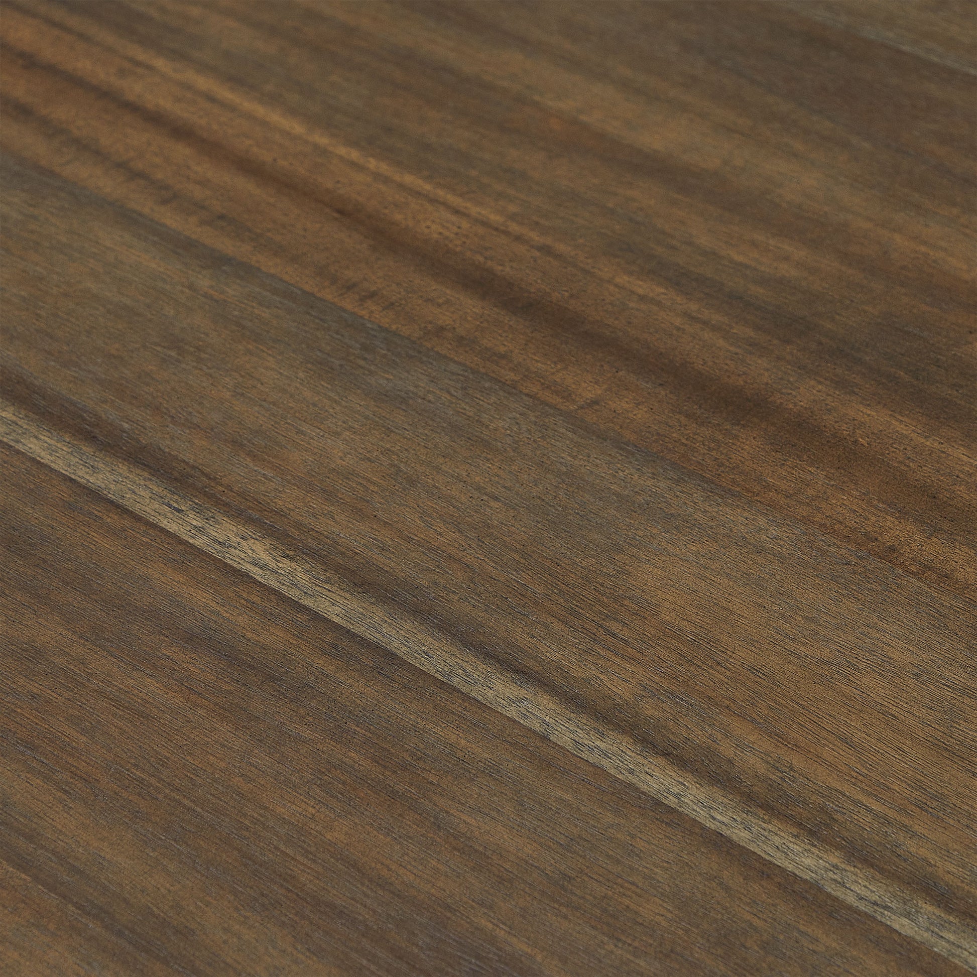 Closeup of rich brown walnut wood grain texture showing natural patterns