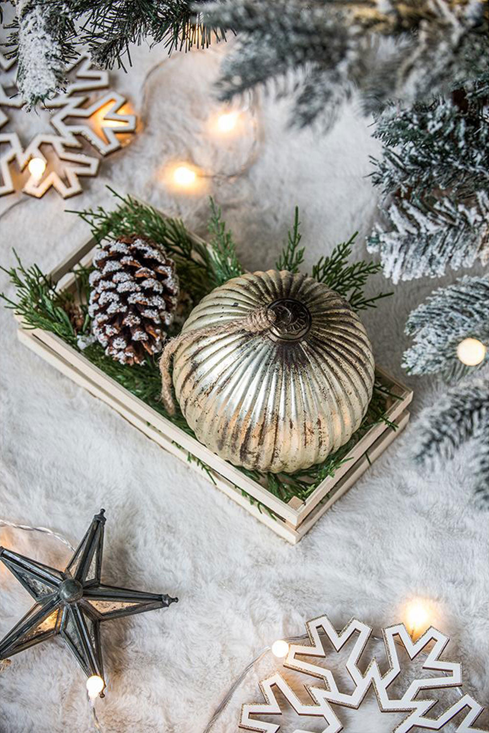 Antique silver ribbed Christmas ornament with twine hanger