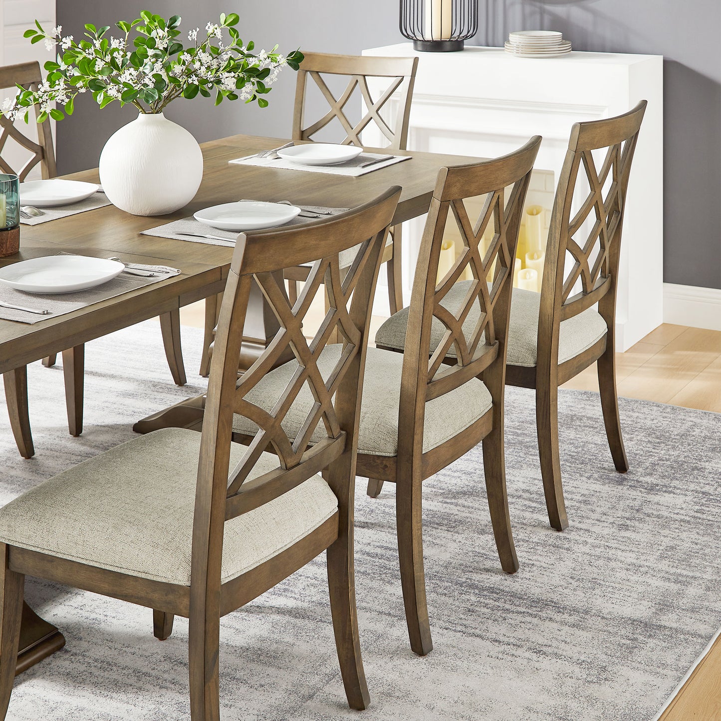 Rustic brown wood dining chairs with diamond back design and beige upholstered seats