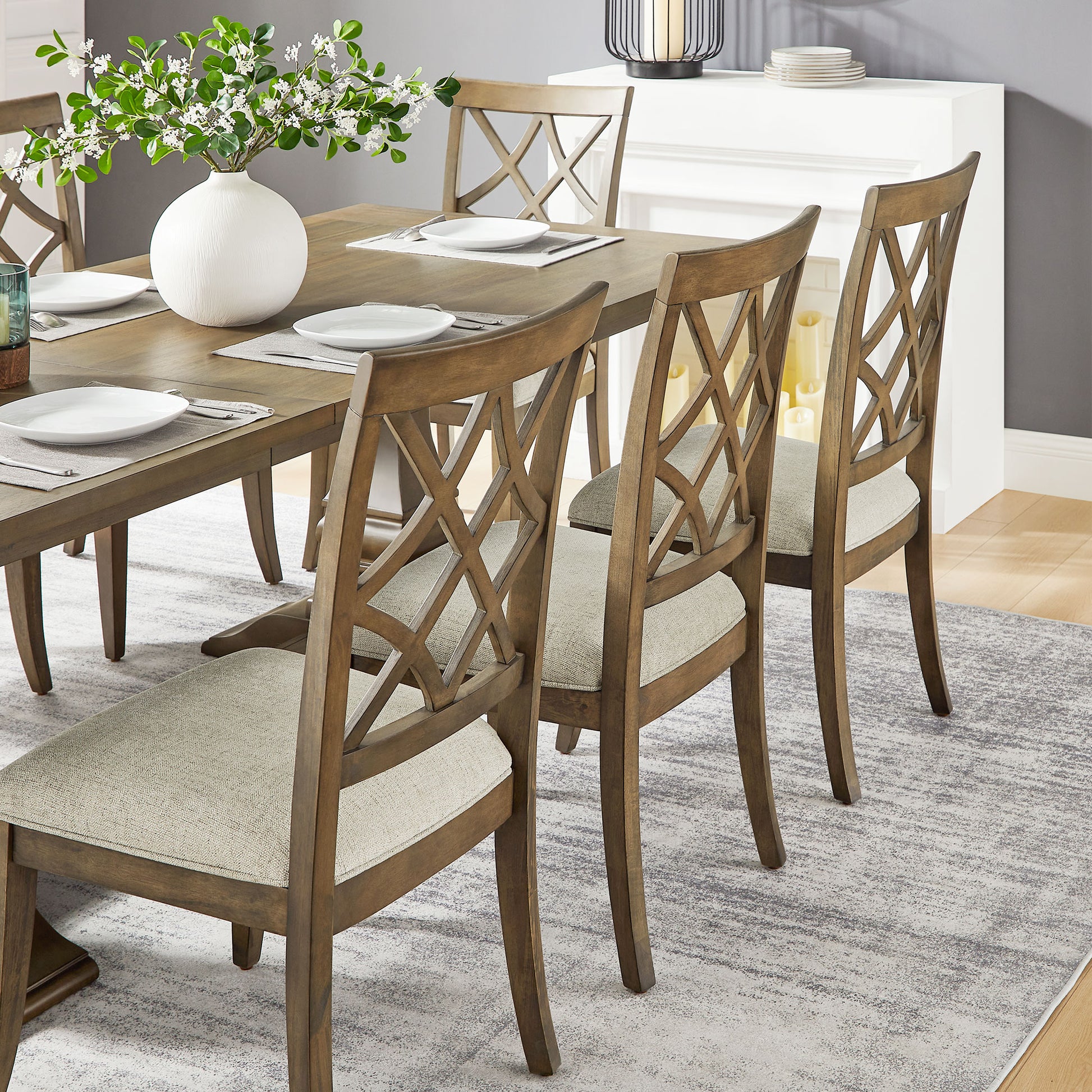 Rustic brown wood dining chairs with diamond back design and beige upholstered seats