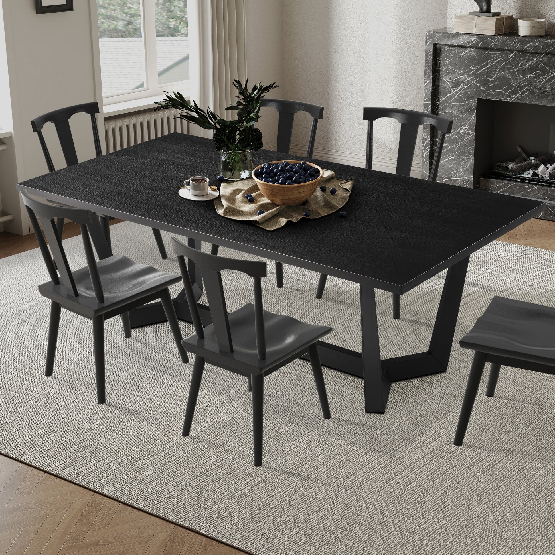 Black textured rectangular dining table with modern metal base