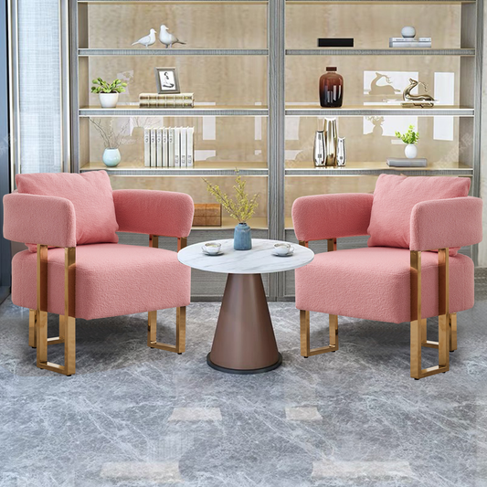 Cozy pink boucl accent chair with modern gold frame