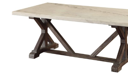 Farmhouse dining table with marble top and dark wood trestle base