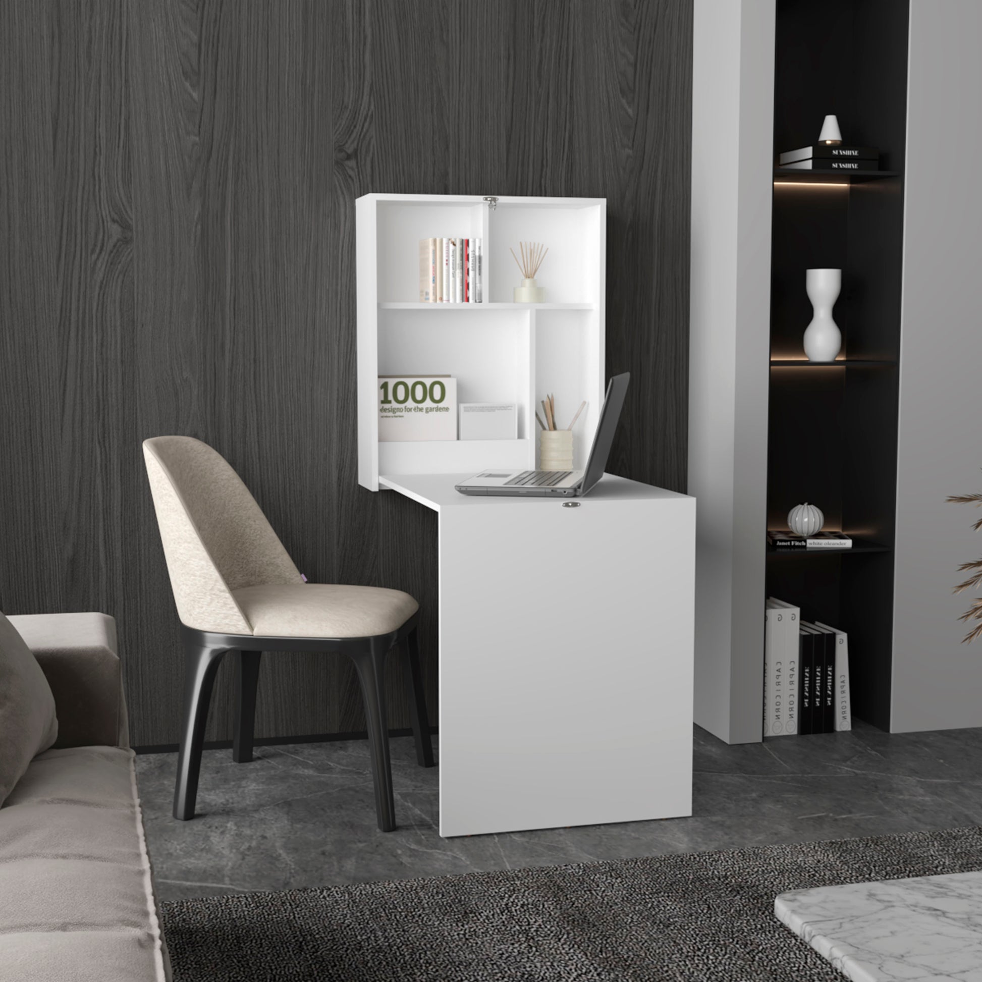 Compact white wallmounted desk with integrated shelving and a laptop