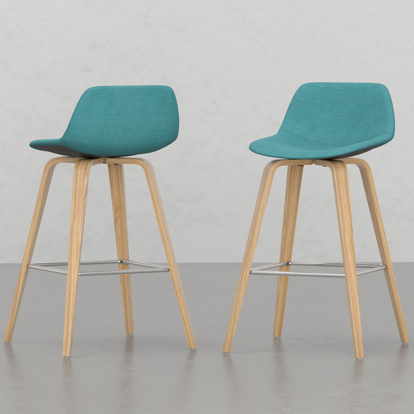 Teal fabric counter stool with light wood legs and metal footrest