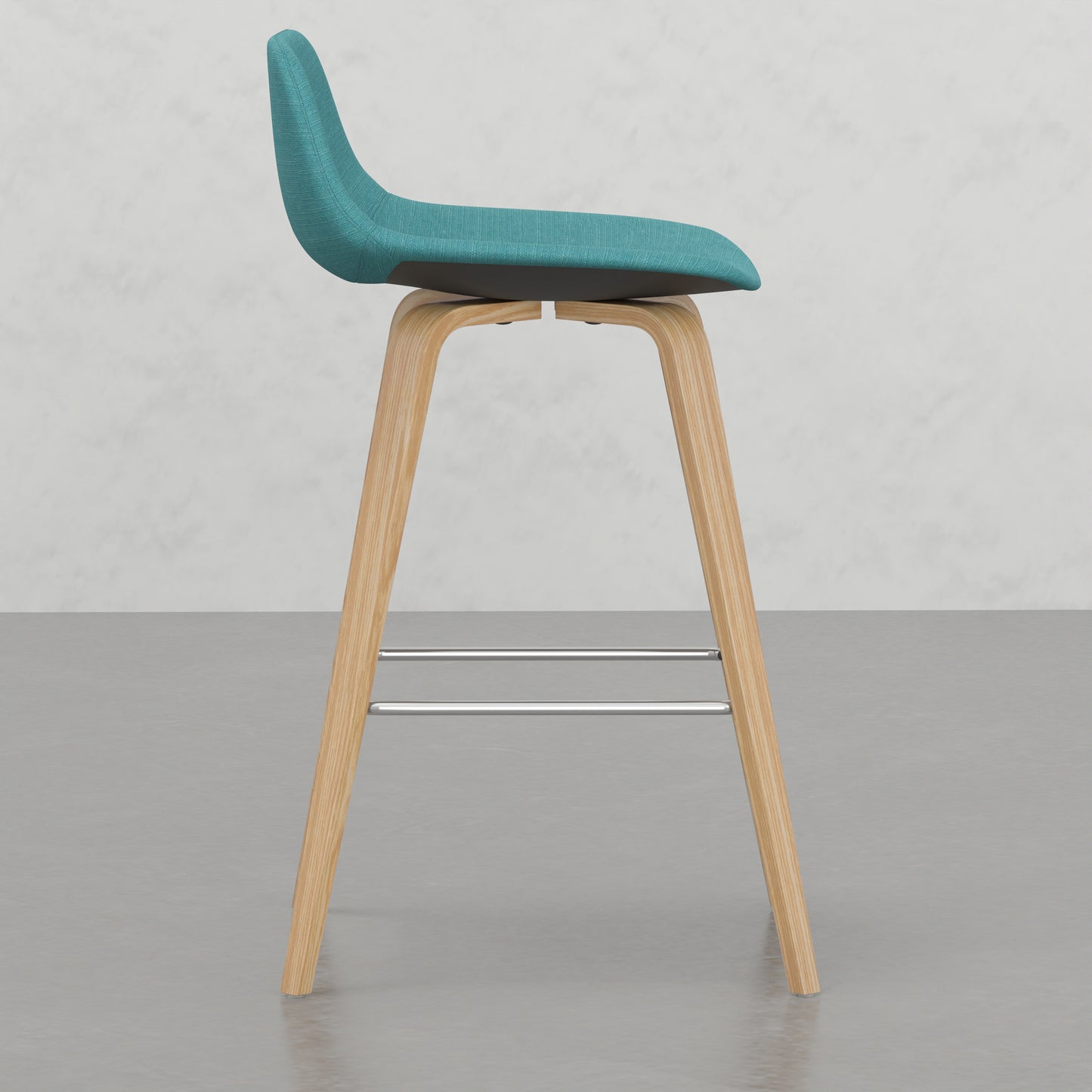 Teal upholstered modern bar stool with natural wood legs and chrome footrest