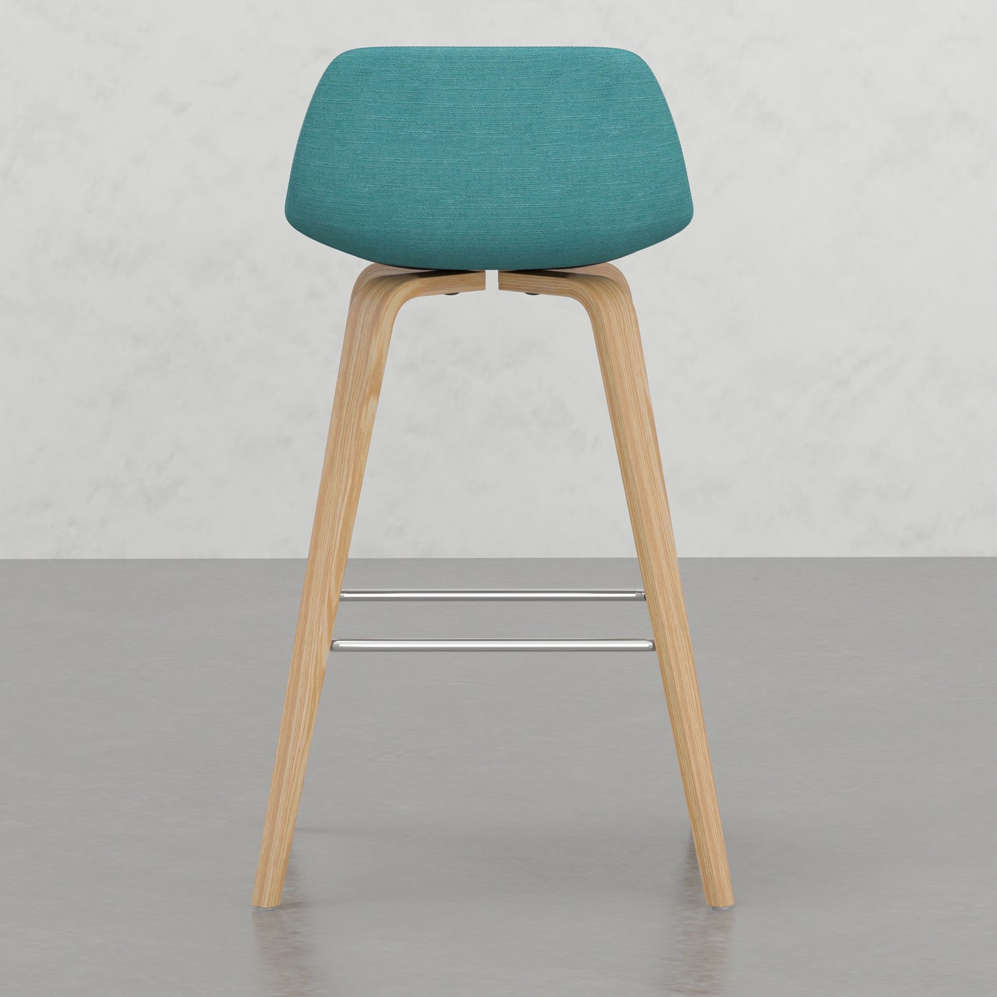 Teal fabric bar stool with natural wood legs and chrome footrest