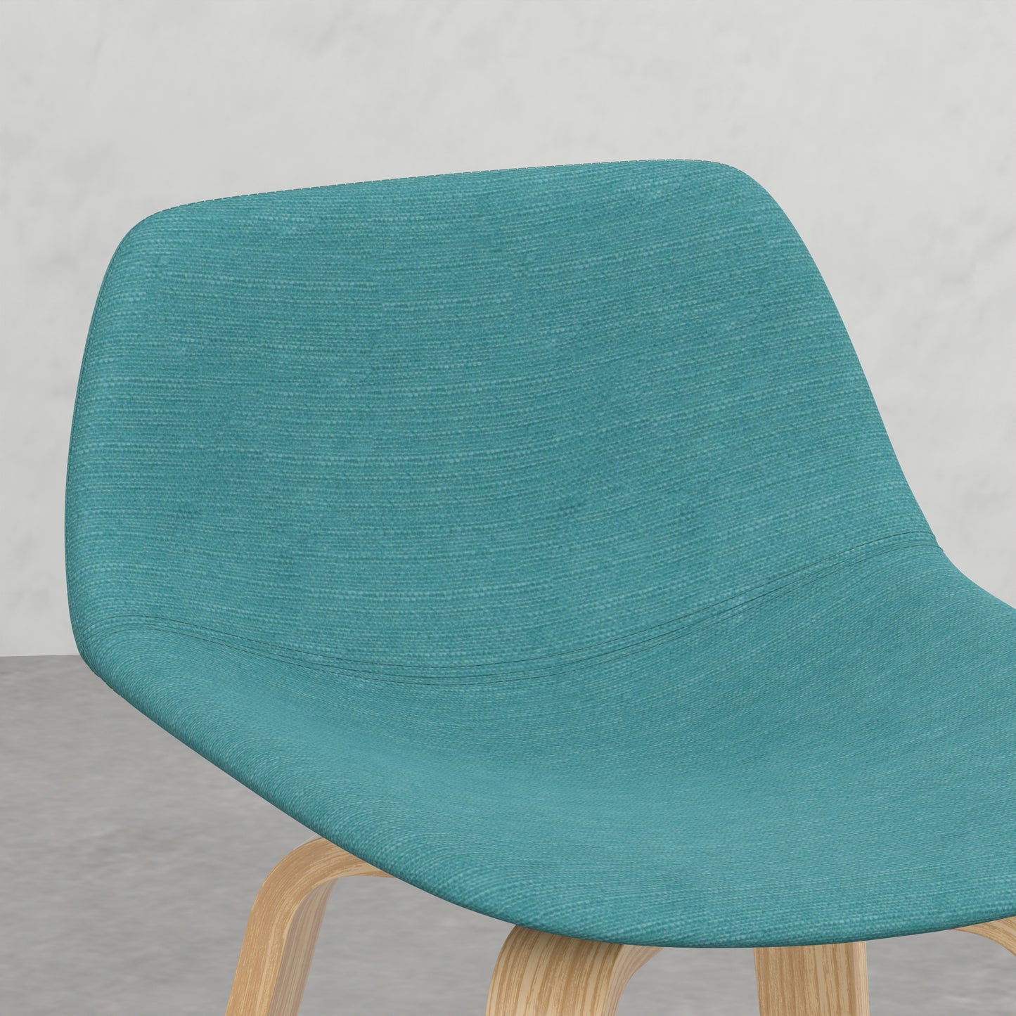 Teal upholstered ergonomic chair with bentwood legs
