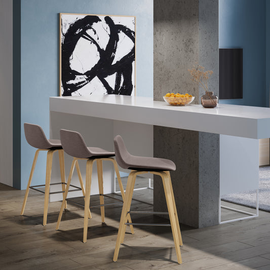 Grey upholstered bar stool with light wood legs and footrest