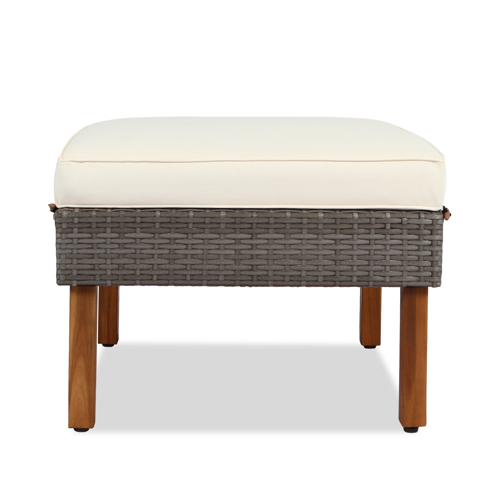 Cream cushioned rattan ottoman with wooden legs