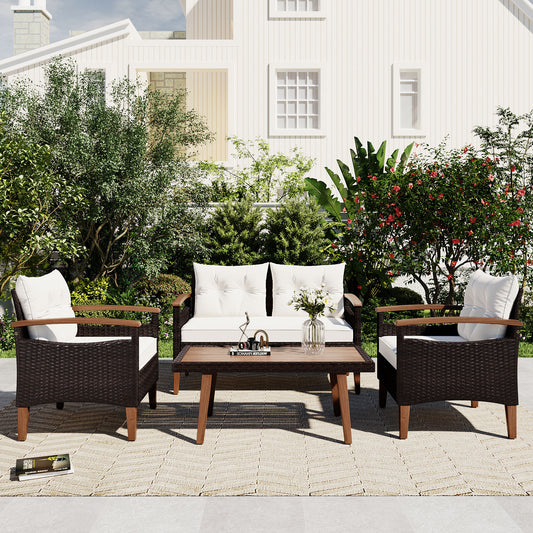 Brown wicker patio furniture set with white cushions