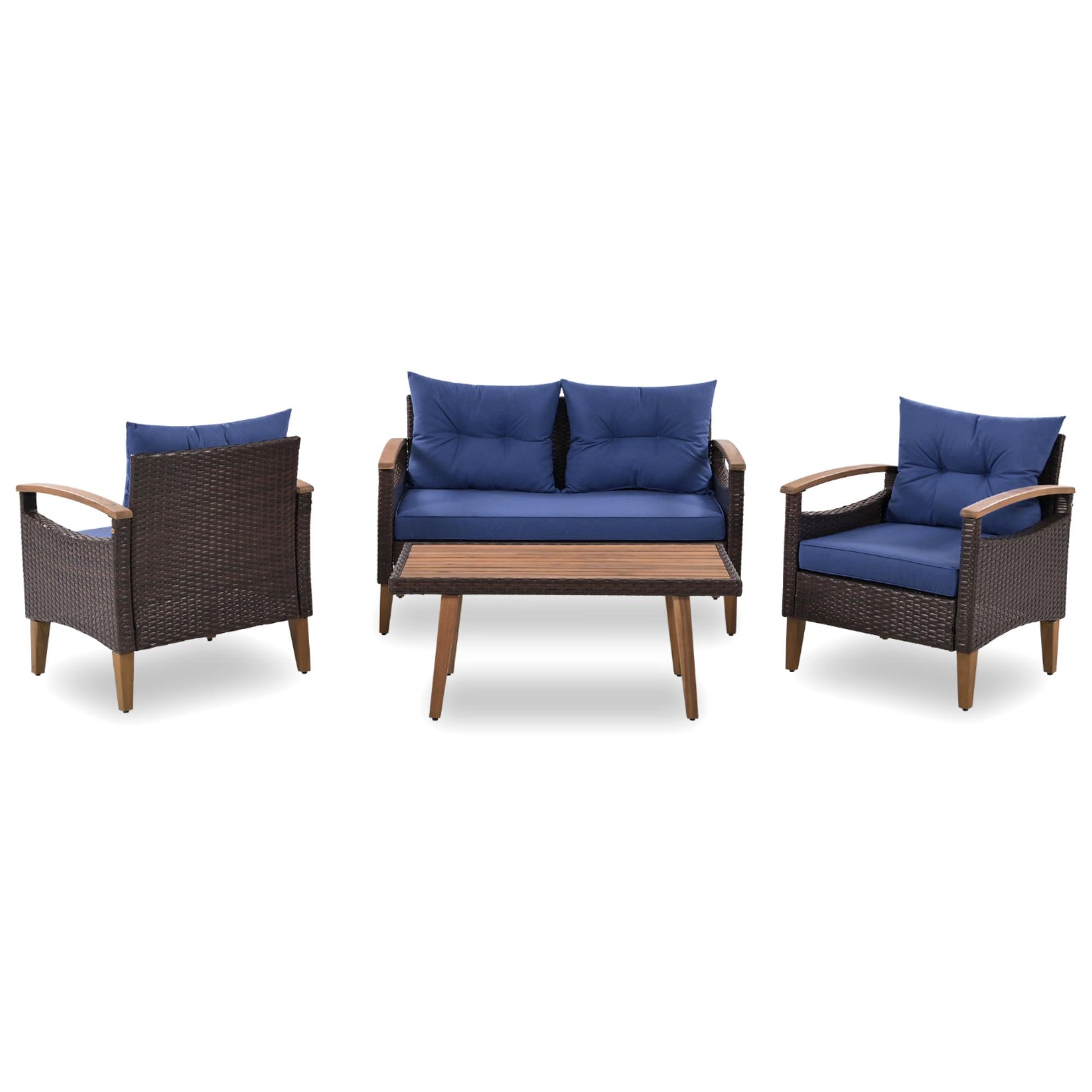 Rattan loveseat and chairs with blue cushions and wood accents