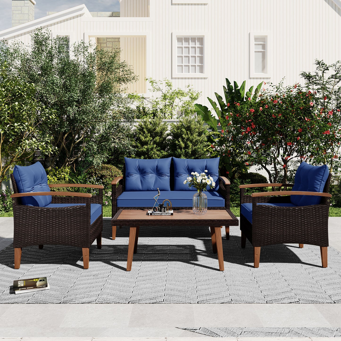 Dark brown wicker patio furniture set with blue cushions