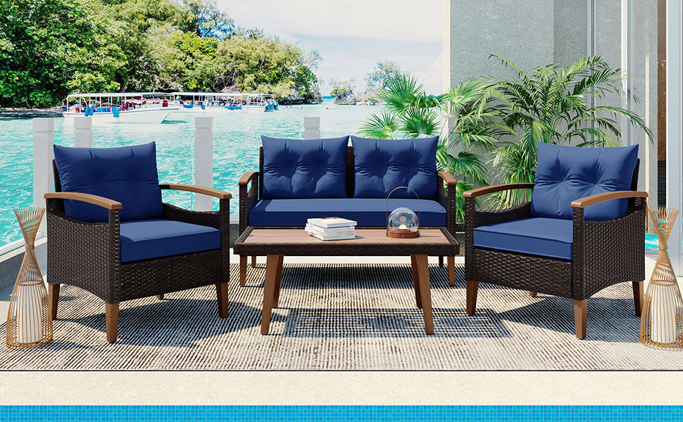 Brown wicker outdoor sofa set with blue cushions on patio