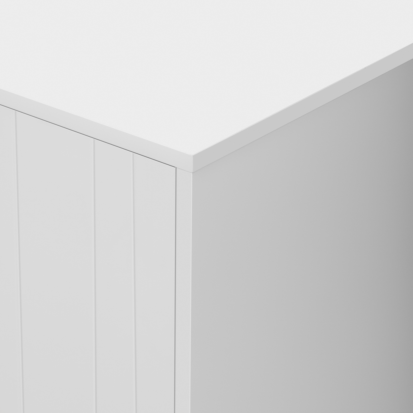 White paneled cabinet door edge