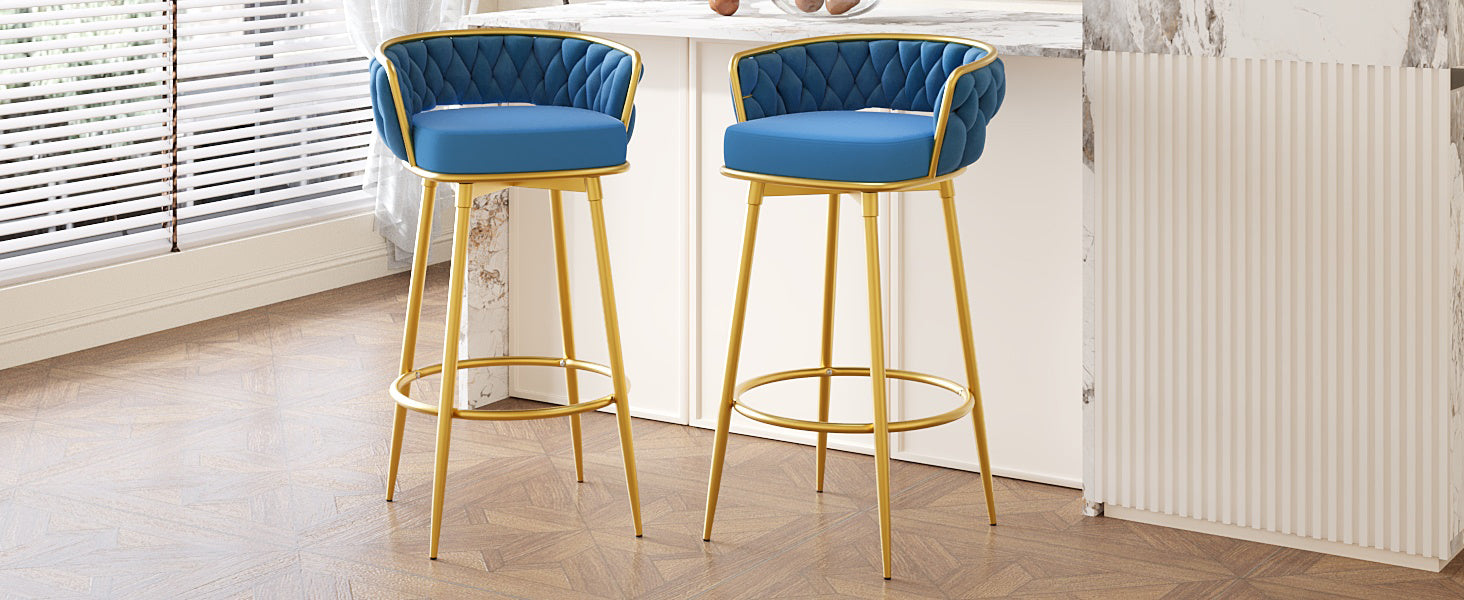 Blue velvet bar stool with gold legs and quilted back