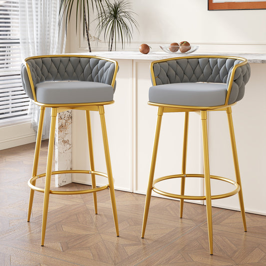 Pair of grey velvet tufted bar stools with gold metal legs