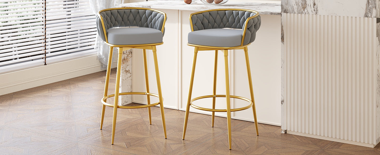 Gray tufted swivel bar stool with gold legs