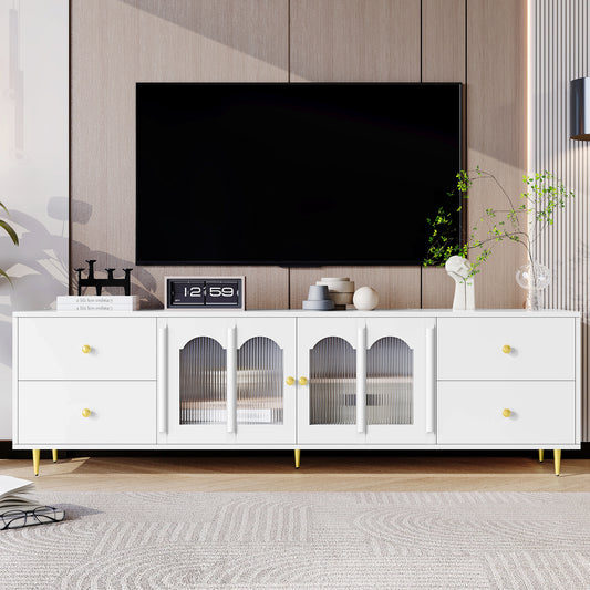Modern white TV stand with gold hardware and fluted glass doors
