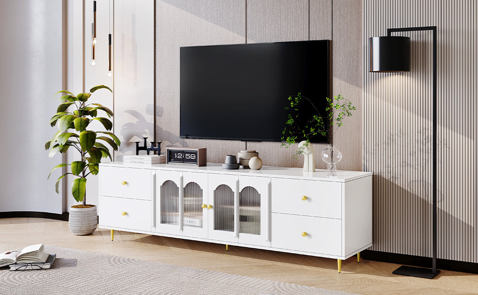 White media console with gold accents and fluted glass doors