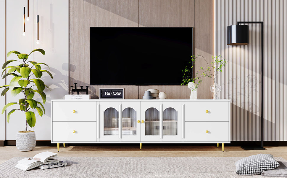 Sleek white media console with fluted glass doors and gold hardware for modern living rooms