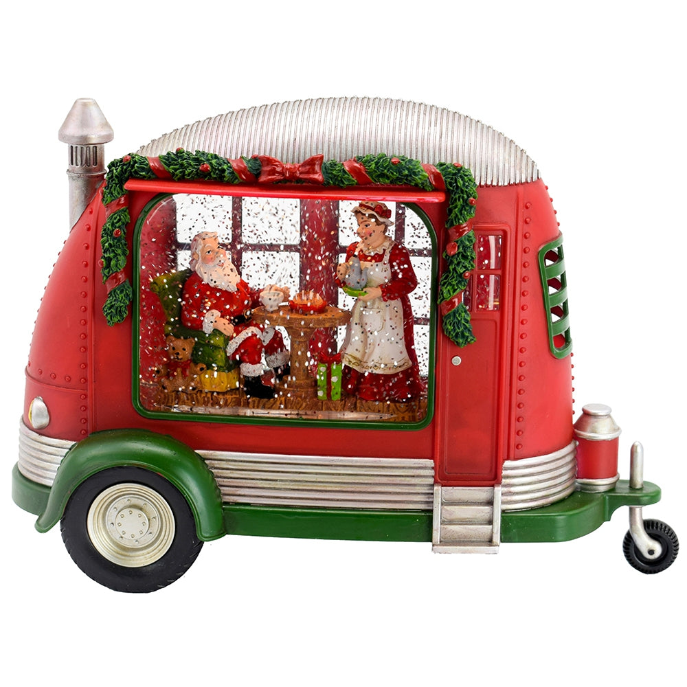 Animated musical snow globe featuring Santa and Mrs Claus in a camper