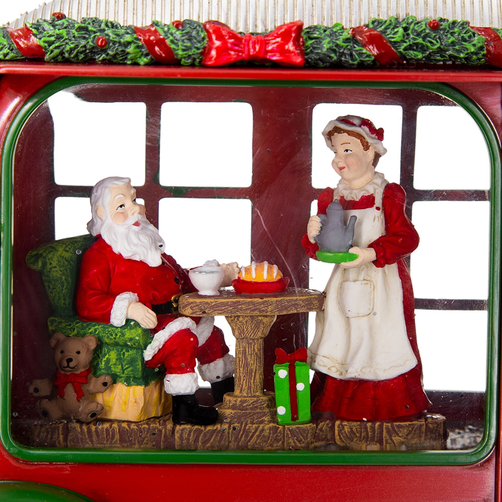 Santa Claus figure serving festive treats