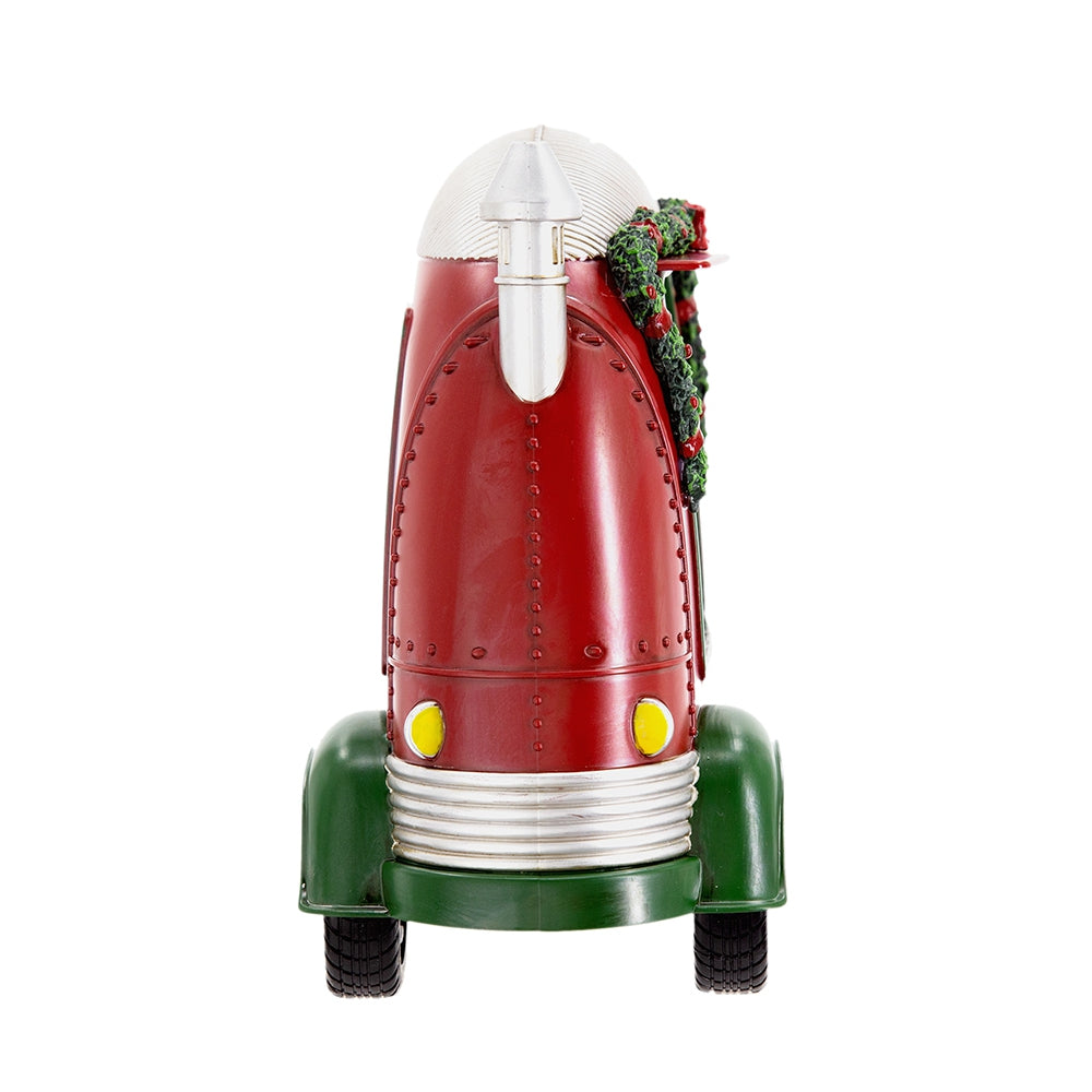 Red retro rocket decoration with green accents and festive wreath