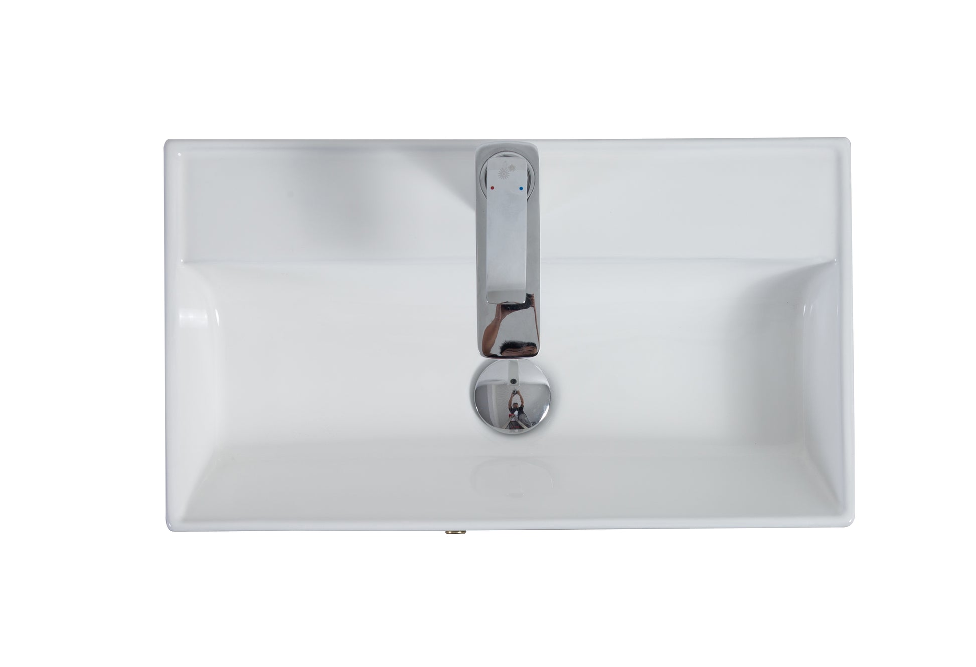 White ceramic vessel sink with modern chrome faucet