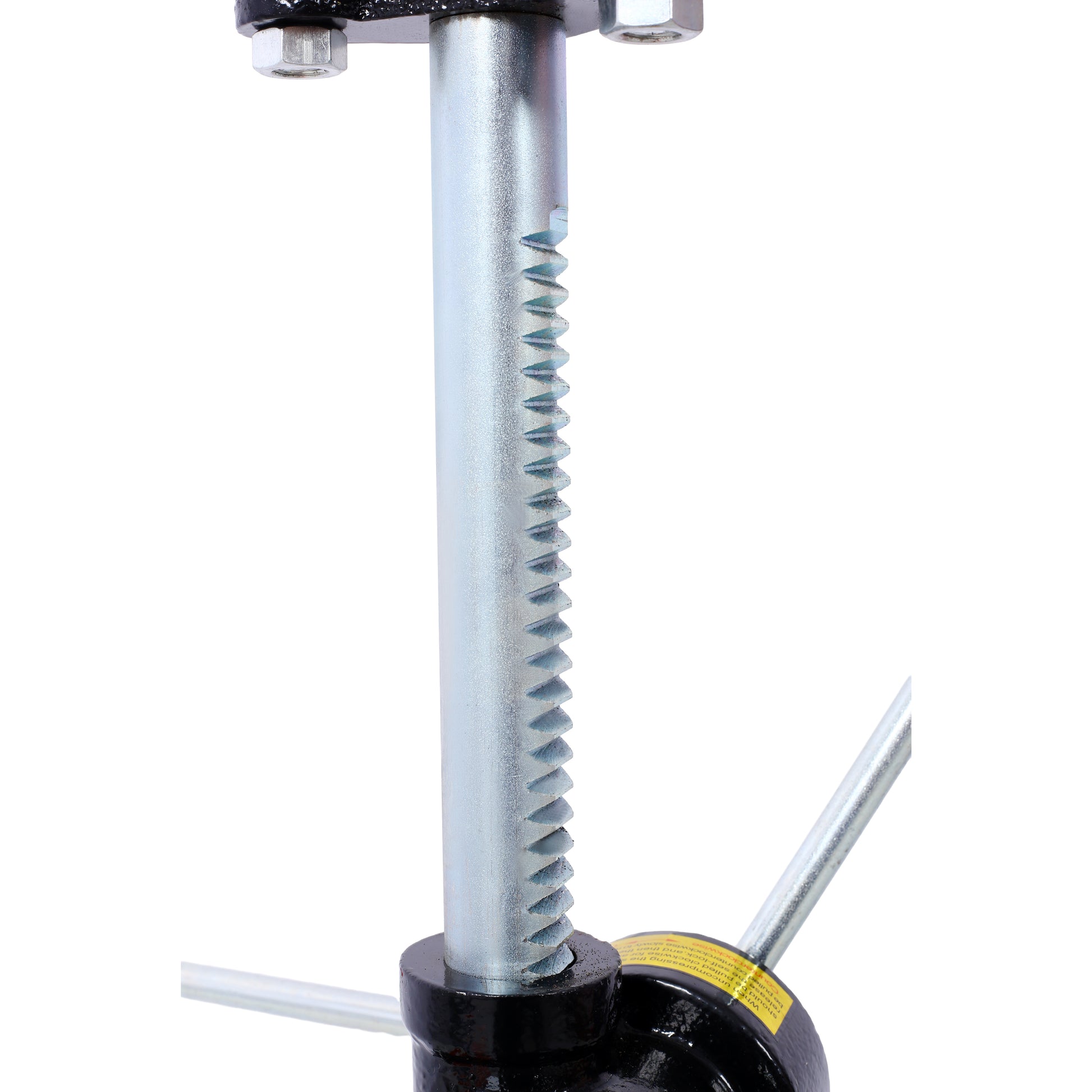 Closeup of a metal scissor jack lifting mechanism with serrated teeth