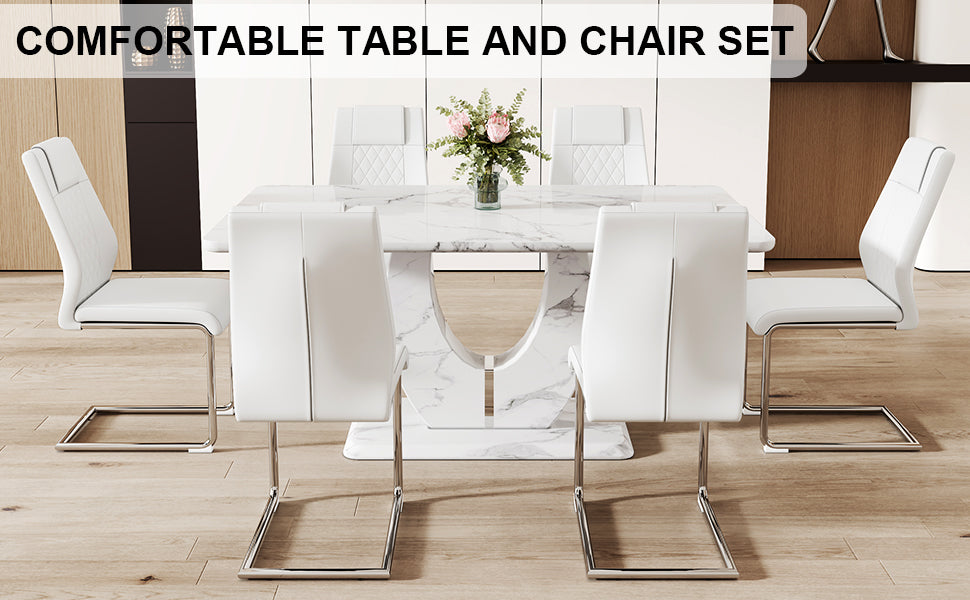 Modern white marble dining table with four sleek white faux leather chairs